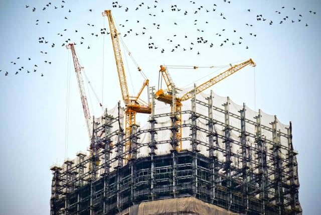 Construction crane on building