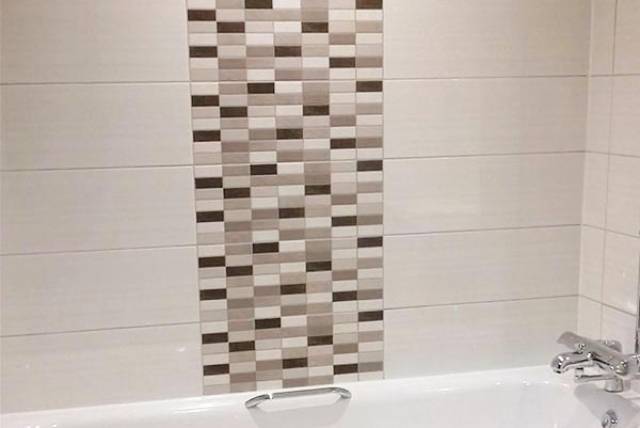 bath with tile feature